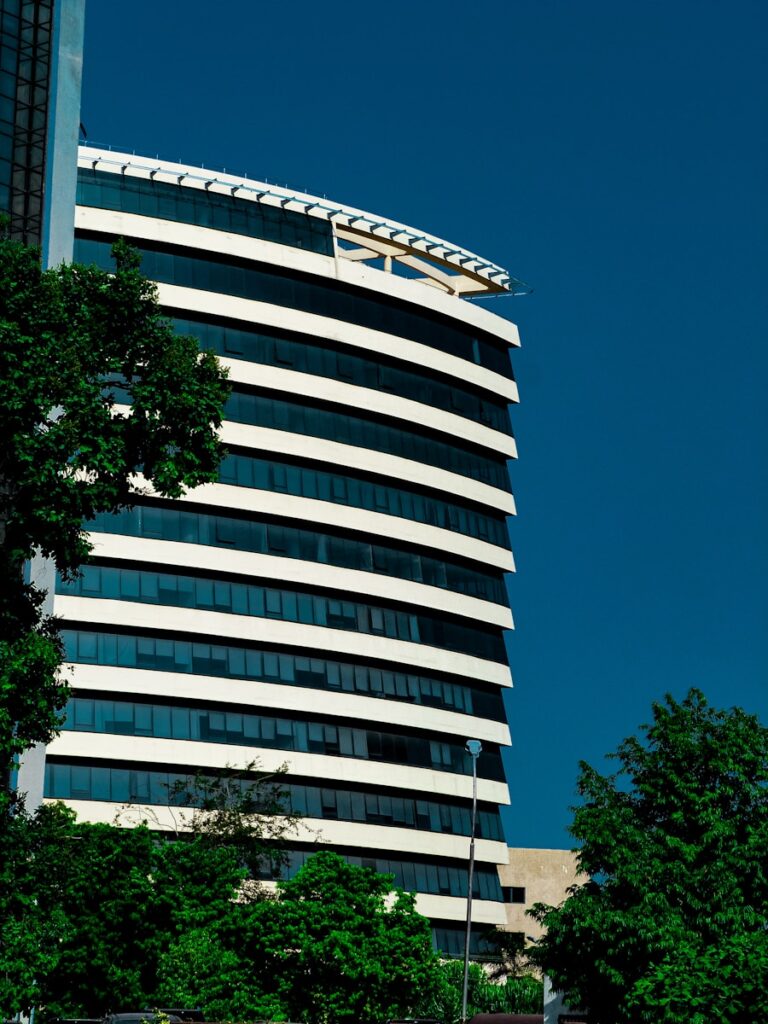 A tall building with a clock on the side of it